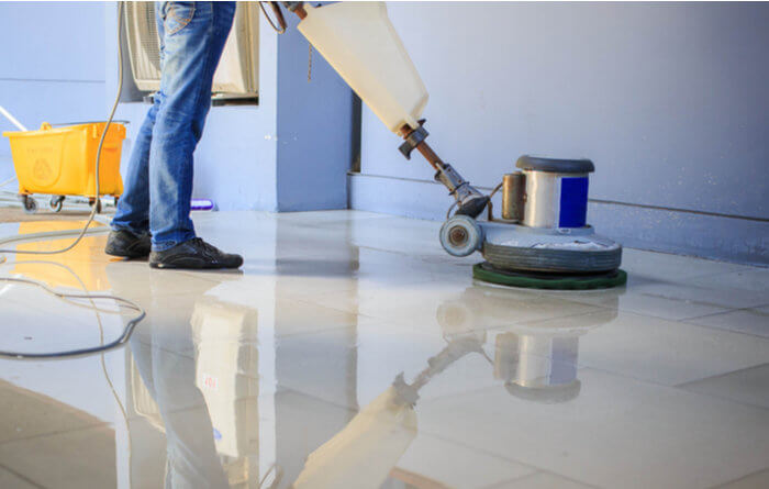 How do you clean a commercial floor?