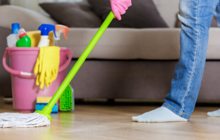 How do you clean commercial hardwood floors?